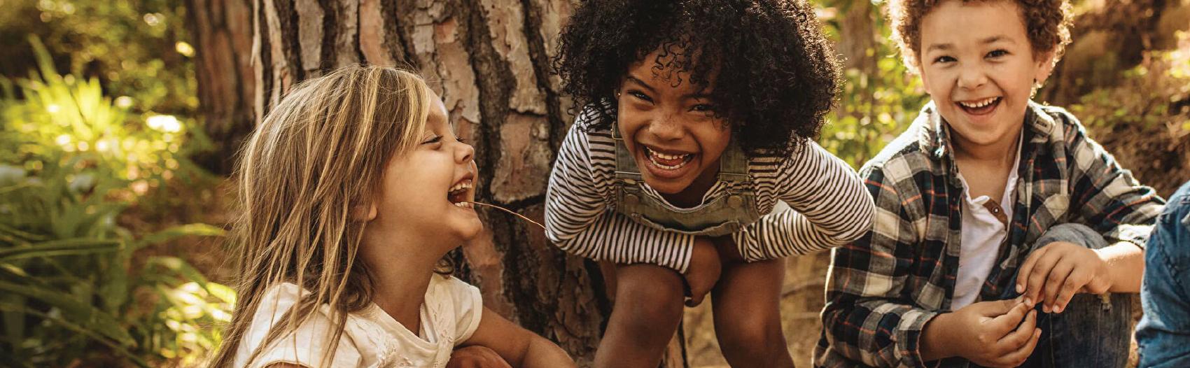 Children playing in woods