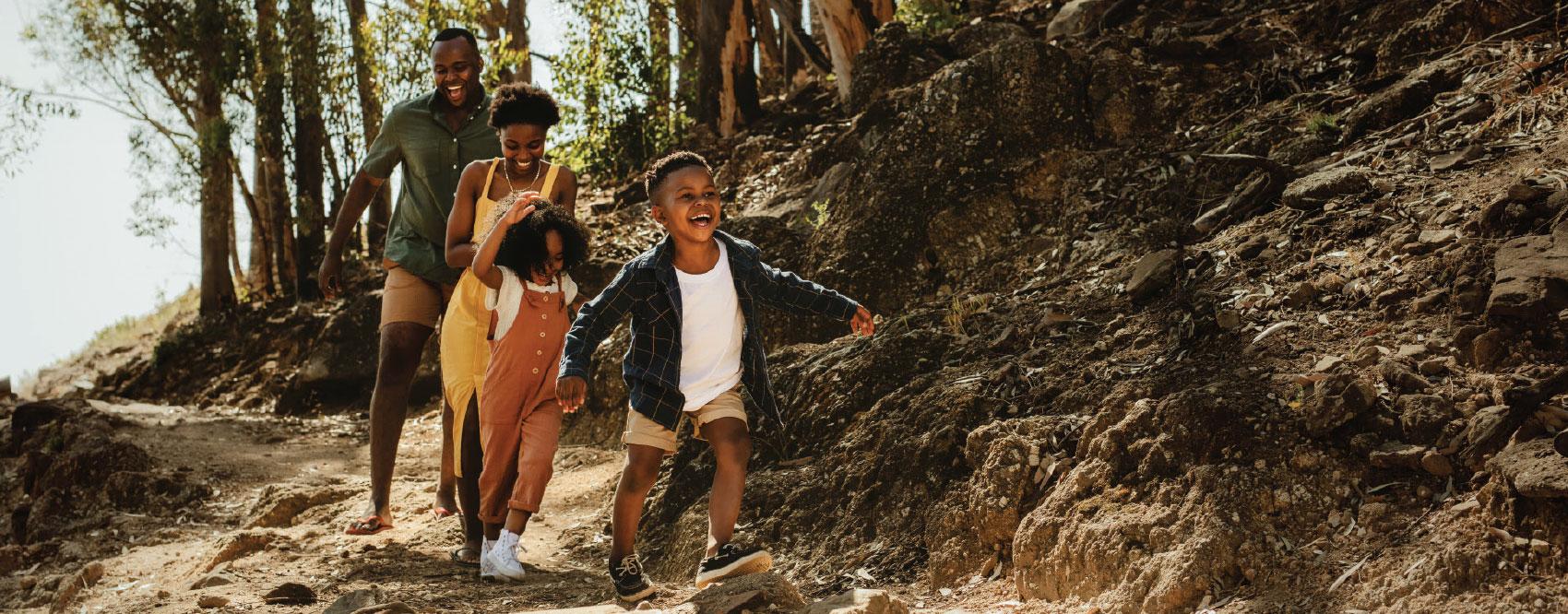 Family hiking through the woods